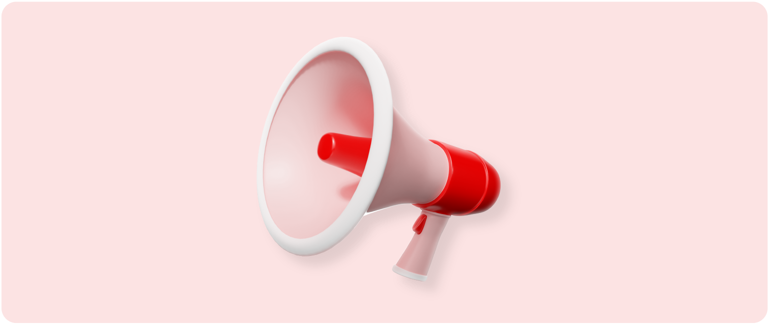 Pink and red megaphone on a pink background