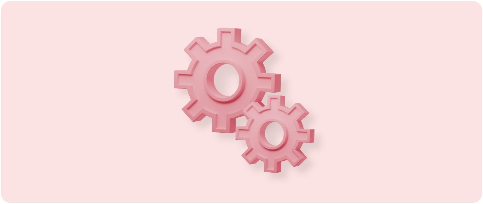 Pink interlocking gears on a pink background